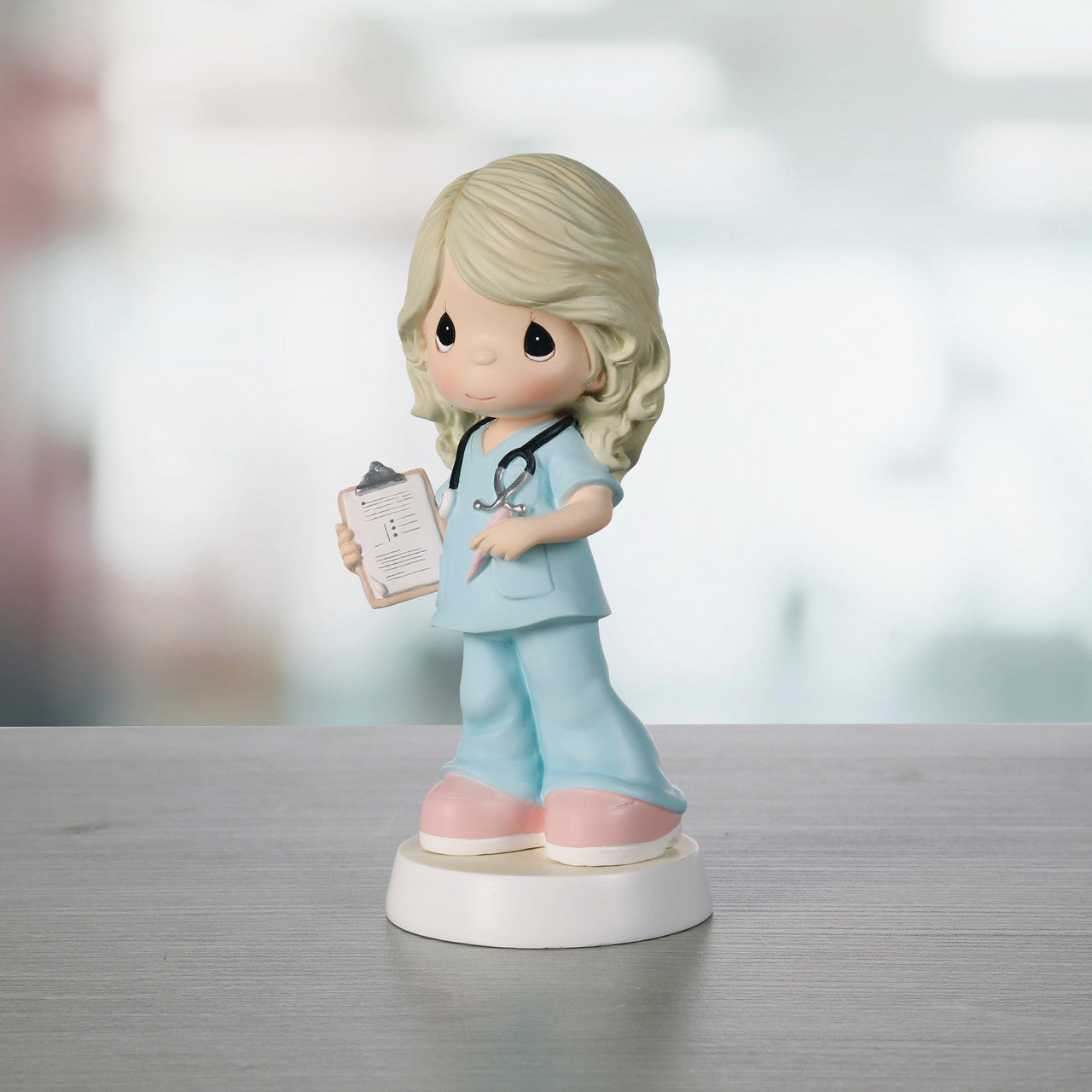 Superhero in Scrubs Precious Moments Figurine