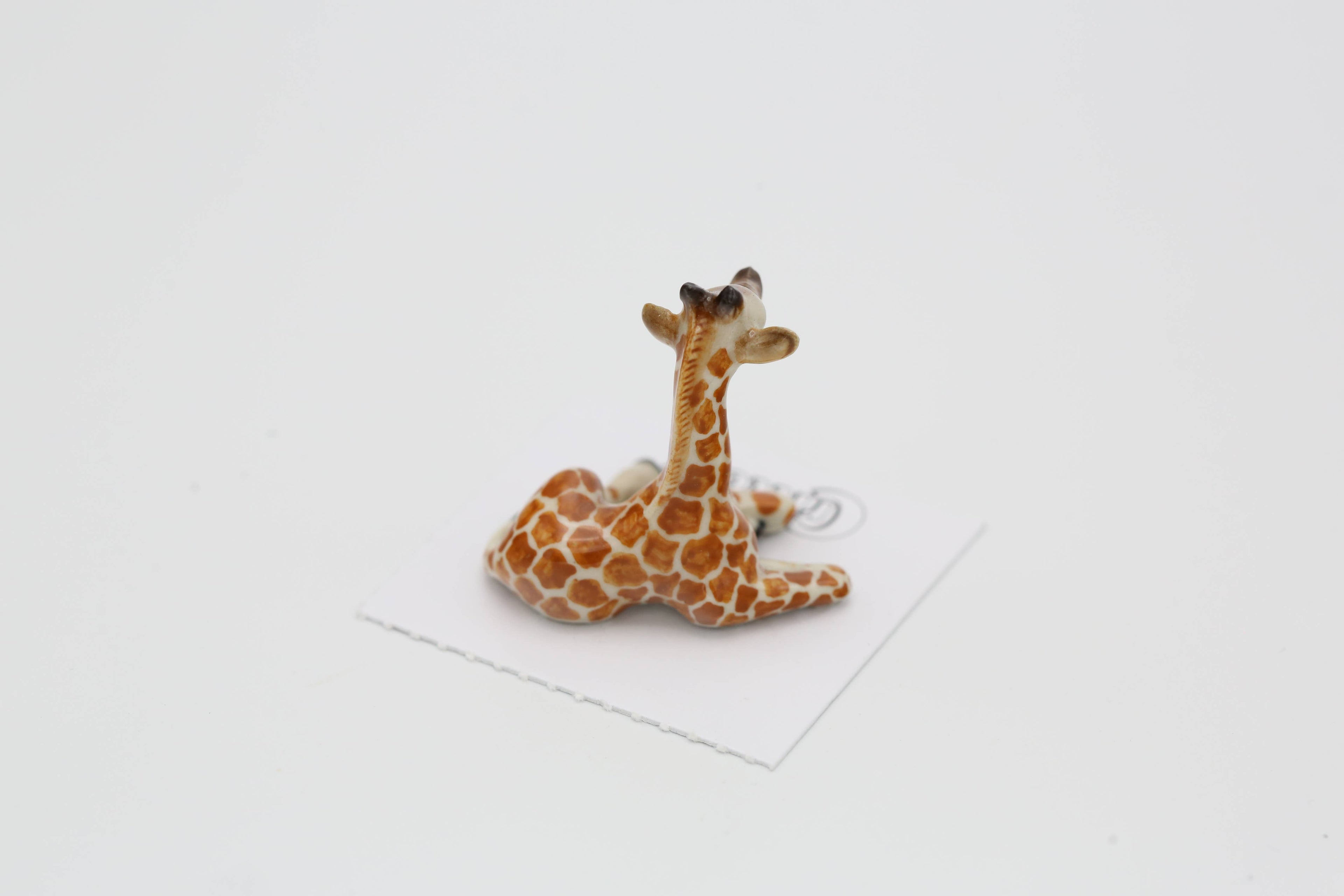 Aerial Giraffe Calf Mini Figurine