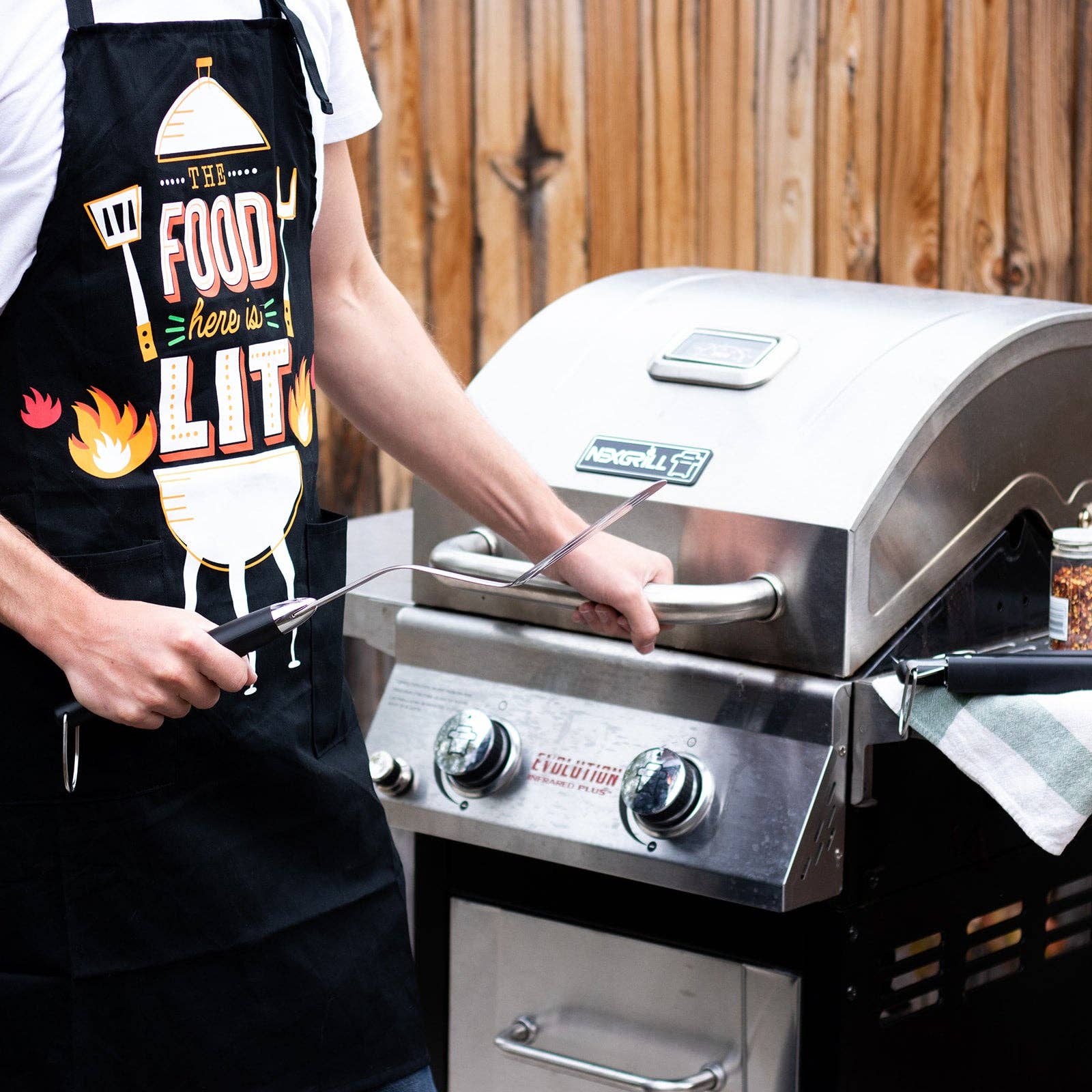 The Food Here Is Lit Apron