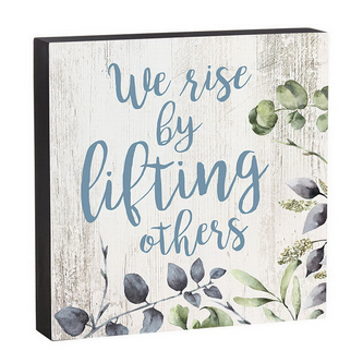 We Rise by Lifting Others Box Sign
