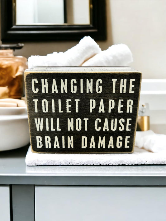 Changing the Toilet Paper Will Not Cause Brain Damage Sign