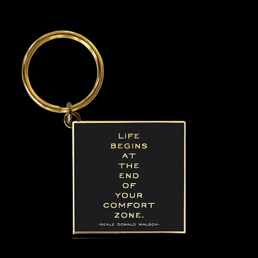 Life begins at the end of your comfort zone keychain