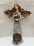 Tree of life angel holding a cross